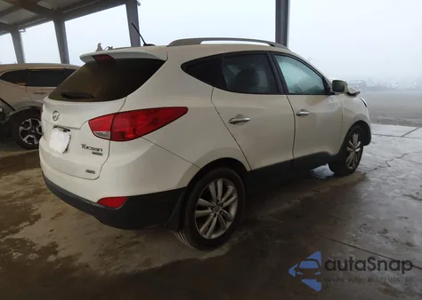 2011 Hyundai Tucson Limited z USA, uszkodzony, nr VIN KM8JUCAC5BU159249